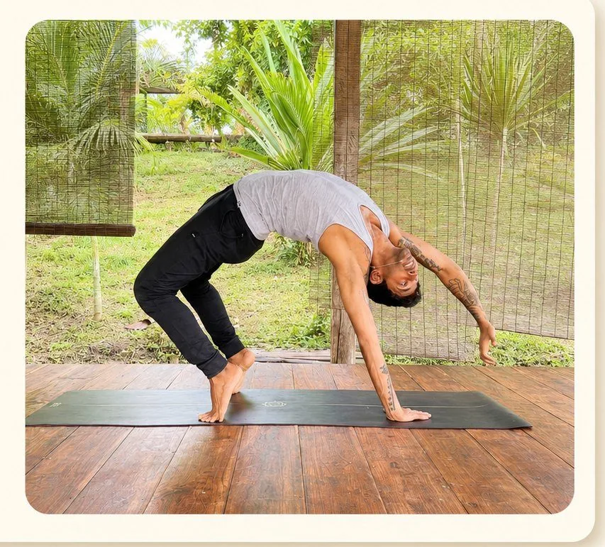 Varun exploring a backbend in an open-air studio