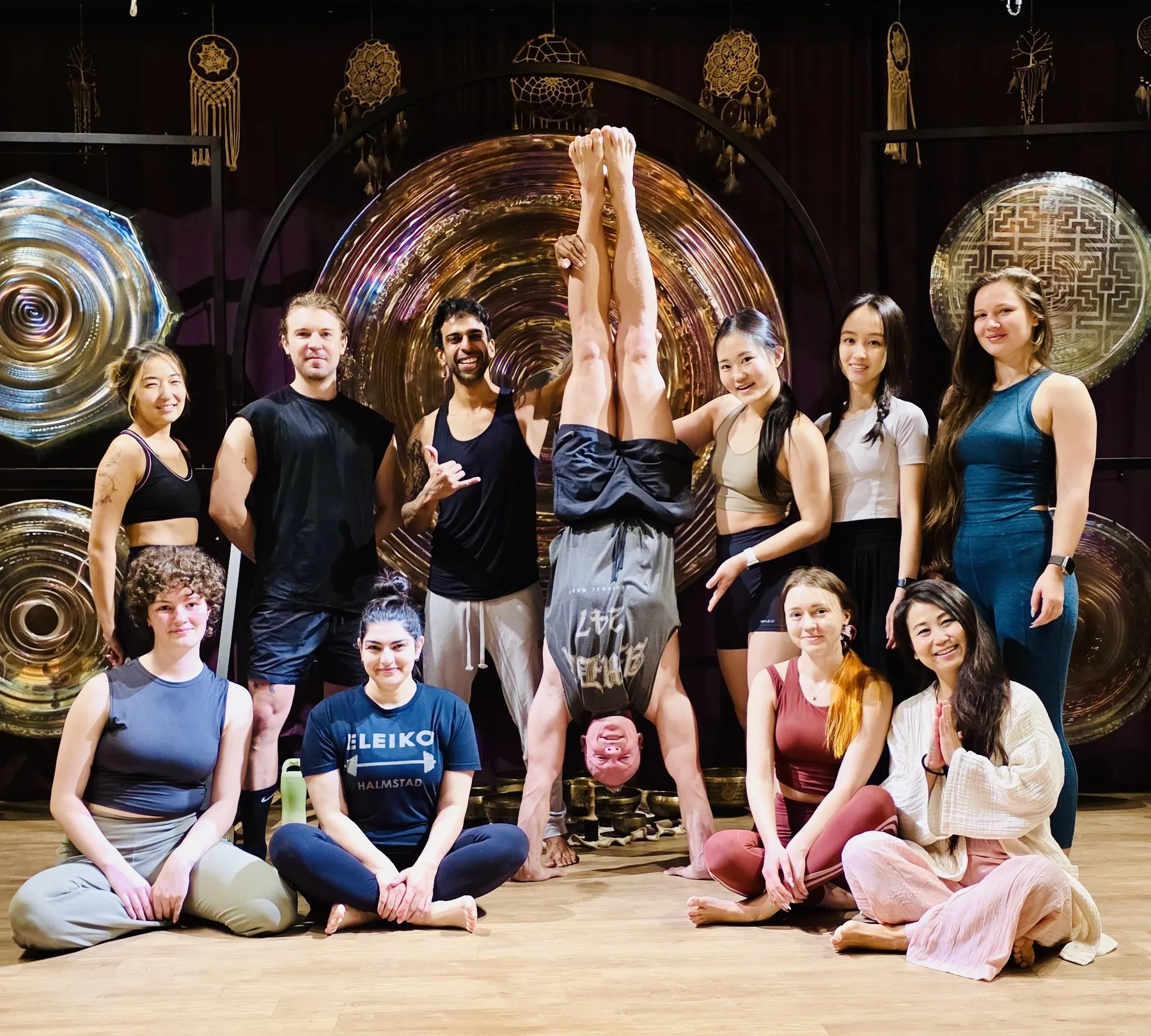 A movement and handstand workshop group gathered together after practice
